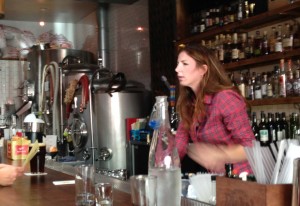 Manager/Founder Elizabeth Wells chats with happy patrons at Southpaw