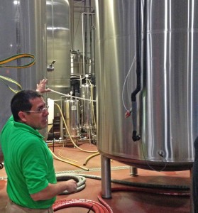 "Joe T" pointing at one of the soon to be three 150bbl fermenting tanks